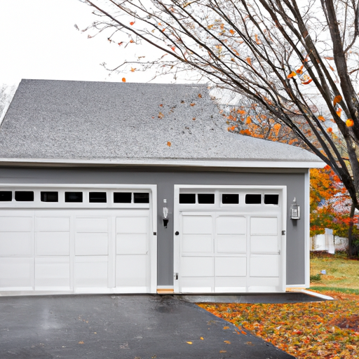 Residential garage door on a New England home in late autumn with light frost on driveway and no people.